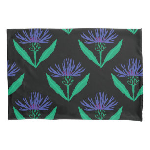 Bold blue cornflower on black pillow case