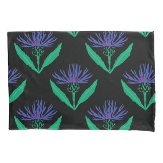 Bold blue cornflower on black pillow case