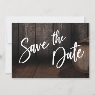 Bold Casual Typography Over Brown Wooden Barrel Save The Date
