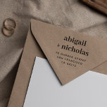 Bold Elegant Couple's Names Wedding Return Address Rubber Stamp<br><div class="desc">Personalized return address wooden stamps. This stylish design showcases the couple's names in bold lowercase serif typography. Below, the address is presented in simple sans-serif capitals. A custom return address stamp not only saves you time but also adds a personalized and professional touch to your envelopes. Perfect for wedding mail,...</div>