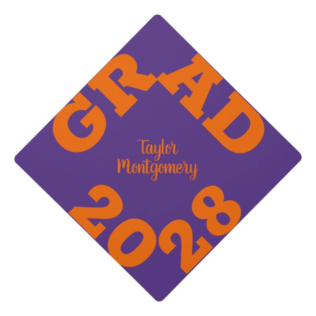 Bold GRAD Orange on Purple Graduation Cap Topper (Front)