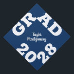 Bold GRAD White and Blue  Graduation Cap Topper<br><div class="desc">GRAD and your class year in bold white letters surround this blue graduation cap topper with your name in the middle. CHANGE THE TOPPER COLOR to anything! **TIP: Click on CUSTOMIZE button; click on COLOR box on top right; enter your color hex code in the #xxxxxx box to match your...</div>