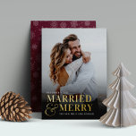 Bold Married & Merry Wedding Photo Newlywed Foil Holiday Card<br><div class="desc">Share a wedding photo at the holidays with these bold,  modern typography-based Christmas photo cards. Design features a full bleed single vertical or portrait oriented photo,  with "married & merry" overlaid in gold foil lettering joined by an oversized ampersand. Personalize with your wedding date and names.</div>