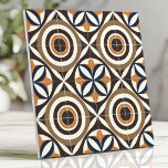 Bold Mid-Century Design with Concentric Circles Ceramic Tile<br><div class="desc">This bold mid-century modern tile features concentric circles and abstract lines in earthy brown, ochre yellow, and vintage blue tones, inspired by 1960s Scandinavian design. With its symmetrical and eye-catching layout, this tile is perfect for creating stylish backsplashes, accent walls, or retro-inspired interiors. The harmonious color palette and geometric design...</div>