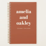 Bold Minimalist Rust Orange Retro Custom Wedding Planner<br><div class="desc">Stay organized while planning your big day with this Personalized Wedding Planner. Featuring a modern minimalist design in earthy rust terracotta with bold typography, this spiral-bound notebook is perfect for jotting down ideas, timelines, and to-do lists. With customizable names and date details, it makes a thoughtful engagement gift for newlyweds-to-be....</div>