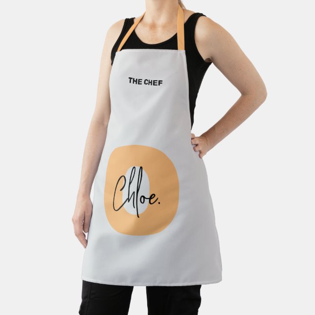 Bold Monogram Orange Lowercase Initial Script Name Apron (Insitu)