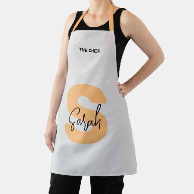 Bold Monogram Orange Uppercase Initial Script Name Apron (Insitu)