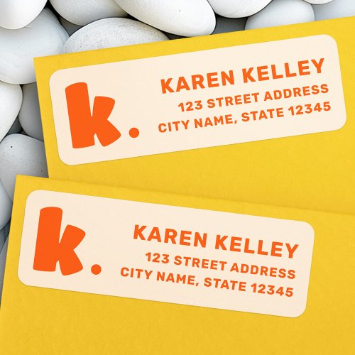 Bold orange monogram return address label