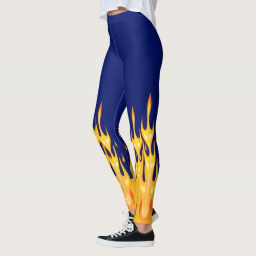 Bold orange yellow fire flames on blue leggings