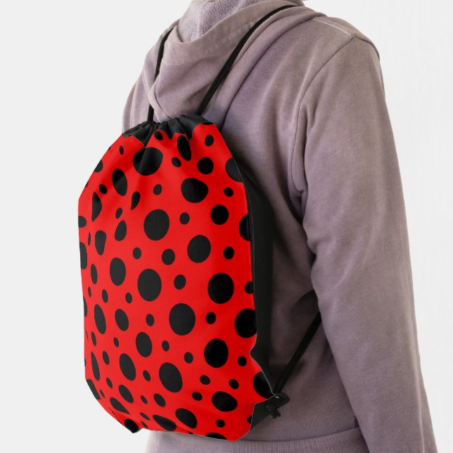 Red and black polka dot drawstring bag