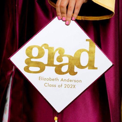 Bold simple modern gold typography on white graduation cap topper