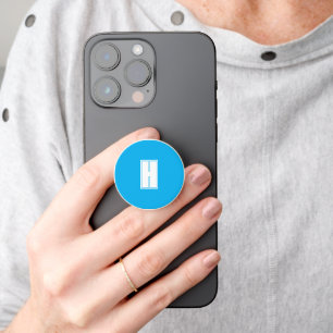 Bold white initial bright blue PopSocket