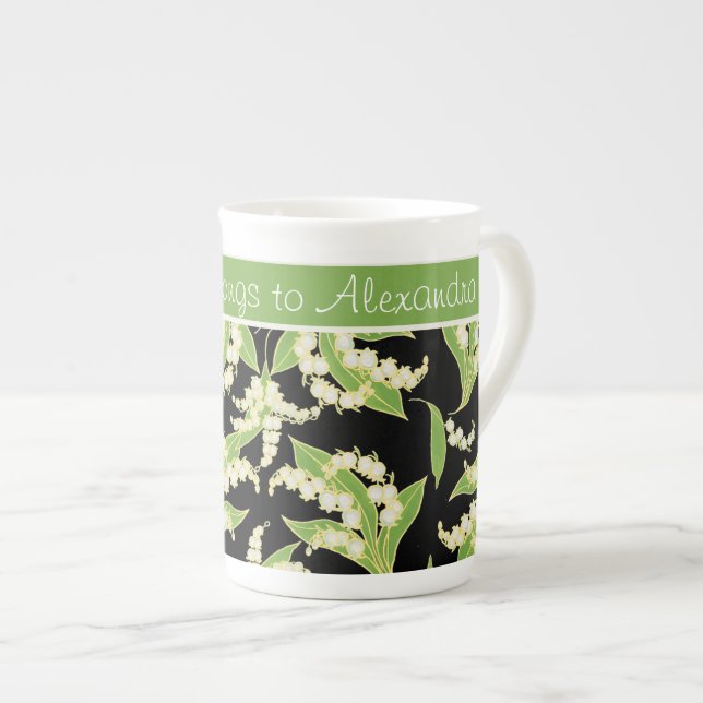 Bone China Coffee Mug: Lilies of the Valley, Black Mug (Front Right)