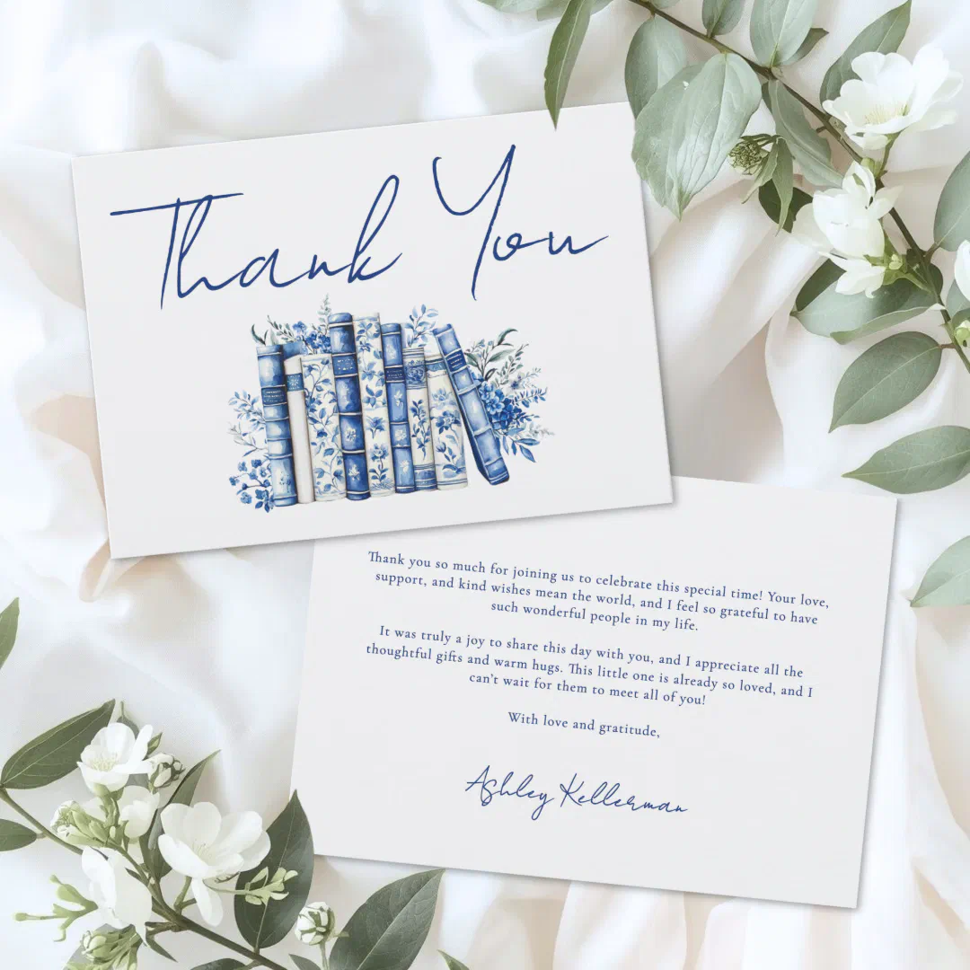 A storybook-themed bridal thank you card with a soft satin background with flowers.