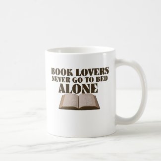 Book lovers never go to bed alone coffee mug