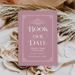 Book Our Date Dusty Rose Vintage Cover Wedding Save The Date<br><div class="desc">These unique wedding save the date cards for book lovers feature a vintage book cover design with a scrolls that frame the wedding date, an ornate "Book Our Date" title, the Bride & Groom names as the authors, a dusty rose pink background / book color (that can be modified), complete...</div>