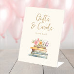 Book Theme Gifts Sign<br><div class="desc">Direct your guests gracefully with our "Gifts and Cards" tabletop sign, elegantly crafted with the soft watercolor illustrations of books and wildflowers typical of the "Wildflower and Books" collection. The sign features a harmonious blend of pink, blue, green, and gold hues on an ivory backdrop, with both vintage typewriter and...</div>