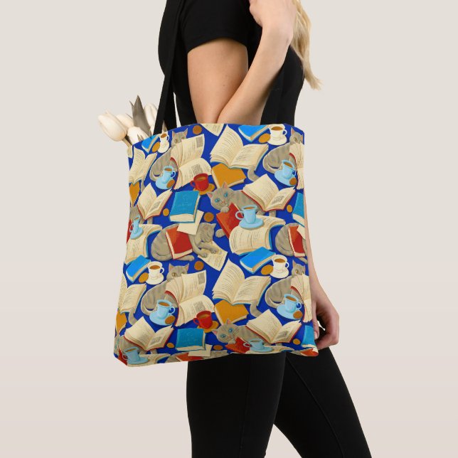 Books and cats on blue tote bag (Close Up)