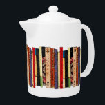Books Teapot<br><div class="desc">This brilliantly colored white porcelain teapot features a shelf of colorful books. They form an interesting abstract vertical geometrical pattern in colors of green, brown, yellow, red, blue, black and pink.</div>