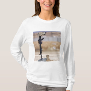 Boots, rifle, dog tags, and protective helmet T-Shirt