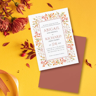 Border of leaves and berries terracotta wedding invitation
