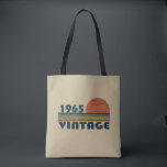 Born in 1965 vintage 60th birthday gift tote bag<br><div class="desc">This vintage classic graphic design with awesome typography font lettering can add originality to your wardrobe collection. It is a great gift idea for men, women, husbands, wives, grandmas, and grandpas who will love this one-of-a-kind artwork. It is the best and most funny holiday present for your happy birthday party....</div>