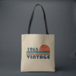Born in 1965 vintage 60th birthday gift tote bag<br><div class="desc">This vintage classic graphic design with awesome typography font lettering can add originality to your wardrobe collection. It is a great gift idea for men, women, husbands, wives, grandmas, and grandpas who will love this one-of-a-kind artwork. It is the best and most funny holiday present for your happy birthday party....</div>