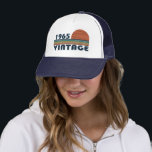 Born in 1965 vintage 60th birthday gift trucker hat<br><div class="desc">This vintage classic graphic design with awesome typography font lettering can add originality to your wardrobe collection. It is a great gift idea for men, women, husbands, wives, grandmas, and grandpas who will love this one-of-a-kind artwork. It is the best and most funny holiday present for your happy birthday party....</div>