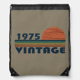 Born in 1975 vintage 49th birthday drawstring bag