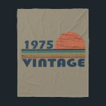 Born in 1975 vintage 50th birthday gift fleece blanket<br><div class="desc">This vintage classic graphic design with awesome typography font lettering can add originality to your wardrobe collection. It is a great gift idea for men, women, husbands, wives, girlfriends, and boyfriends who will love this one-of-a-kind artwork. It is the best and most funny holiday present for your happy birthday party....</div>