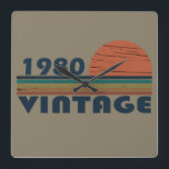 Born in 1980 vintage birthday square wall clock<br><div class="desc">You can add some originality to your wardrobe with this original 1980 vintage sunset retro-looking birthday design with awesome colors and typography font lettering, is a great gift idea for men, women, husband, wife girlfriend, and a boyfriend who will love this one-of-a-kind artwork. The best amazing and funny holiday present...</div>