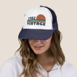 Born in 1982 vintage birthday trucker hat<br><div class="desc">You can add some originality to your wardrobe with this original 1982 vintage sunset retro-looking birthday design with awesome colors and typography font lettering, is a great gift idea for men, women, husband, wife girlfriend, and a boyfriend who will love this one-of-a-kind artwork. The best and most fun holiday present...</div>