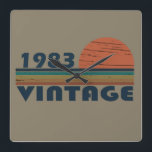 Born in 1983 vintage birthday square wall clock<br><div class="desc">You can add some originality to your wardrobe with this original 1983 vintage sunset retro-looking birthday design with awesome colors and typography font lettering, is a great gift idea for men, women, husband, wife girlfriend, and a boyfriend who will love this one-of-a-kind artwork. The best amazing and funny holiday present...</div>
