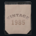 born in 1985 vintage 40th birthday gift drawstring bag<br><div class="desc">This modern graphic design with awesome typography font lettering can add originality to your wardrobe collection. It is a great gift idea for men, women, husbands, wives, girlfriends, and boyfriends who will love this one-of-a-kind artwork. It is the best and most funny holiday present for your happy birthday party. If...</div>