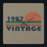born in 1987 vintage birthday square wall clock<br><div class="desc">You can add some originality to your wardrobe with this original 1987 vintage sunset retro-looking birthday design with awesome colors and typography font lettering, is a great gift idea for men, women, husband, wife girlfriend, and a boyfriend who will love this one-of-a-kind artwork. The best amazing and funny holiday present...</div>