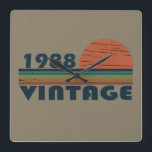 born in 1988 vintage birthday square wall clock<br><div class="desc">You can add some originality to your wardrobe with this original 1988 vintage sunset retro-looking birthday design with awesome colors and typography font lettering, is a great gift idea for men, women, husband, wife girlfriend, and a boyfriend who will love this one-of-a-kind artwork. The best amazing and funny holiday present...</div>