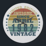 Born in april 1982 vintage birthday large clock<br><div class="desc">You can add some originality to your wardrobe with this original 1982 vintage sunset retro-looking birthday design with awesome colors and typography font lettering, is a great gift idea for men, women, husband, wife girlfriend, and a boyfriend who will love this one-of-a-kind artwork. The best amazing and funny holiday present...</div>