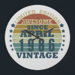 born in april 1986 vintage birthday large clock<br><div class="desc">You can add some originality to your wardrobe with this original 1986 vintage sunset retro-looking birthday design with awesome colors and typography font lettering, is a great gift idea for men, women, husband, wife girlfriend, and a boyfriend who will love this one-of-a-kind artwork. The best amazing and funny holiday present...</div>