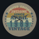 born in april 1989 vintage birthday large clock<br><div class="desc">You can add some originality to your wardrobe with this original 1989 vintage sunset retro-looking birthday design with awesome colors and typography font lettering, is a great gift idea for men, women, husband, wife girlfriend, and a boyfriend who will love this one-of-a-kind artwork. The best amazing and funny holiday present...</div>
