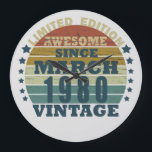 Born in March 1980 vintage birthday Large Clock<br><div class="desc">You can add some originality to your wardrobe with this original 1980 vintage sunset retro-looking birthday design with awesome colors and typography font lettering, is a great gift idea for men, women, husband, wife girlfriend, and a boyfriend who will love this one-of-a-kind artwork. The best amazing and funny holiday present...</div>