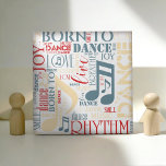 Born to Dance Blue/Red/Gold ID277 Ceramic Tile<br><div class="desc">Is dancing your passion? This cool ceramic tile with a word cloud design says it all. Some of the words, interspersed with musical notes, are: breathe, live, love, dance, rhythm and born to dance. This version features warm shades of red, soft yellow and blue on the background color of your...</div>