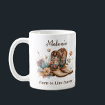 Born to Line Dance Cowboy Floral Boots Coffee Mug<br><div class="desc">Add a rustic charm to your wardrobe with this unique cowboy floral coffee mug. Featuring classic cowboy boots adorned with delicate boho-style flowers in earthy tones, this coffee mug captures the spirit of the Wild West with a modern, artistic twist. Perfect for personalizing with your special girl's name, this mug...</div>