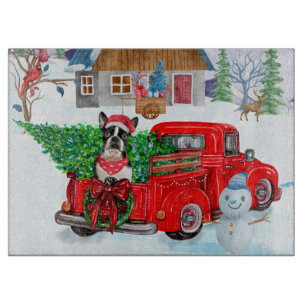 Boston Terrier dog In Christmas Delivery Truck Cutting Board