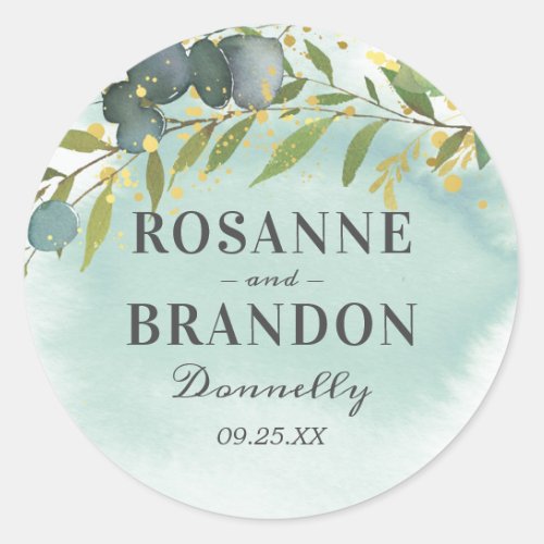 Botanical Green Gold Wedding Classic Round Sticker - Elegant wedding stickers featuring a green/blue watercolor wash, enchanting botanical eucalyptus leaves, splashes of faux gold foil, the couples name, and wedding date.