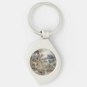 Botanical scene of zebras and lions in an oasis keychain