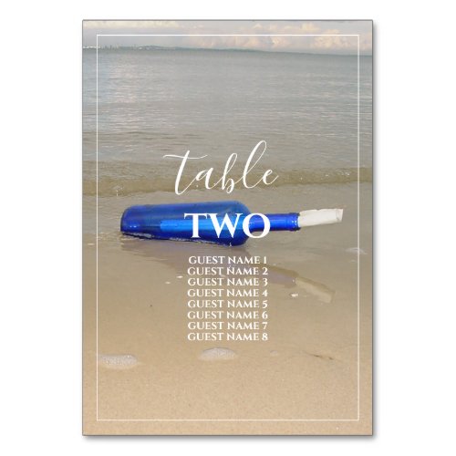Bottle On Beach Sand Wedding Guest Names Table Number