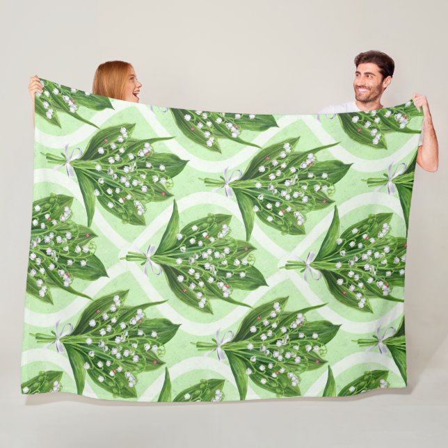 Bouquet of lilly of the valley flowers on green fleece blanket (In Situ)