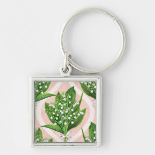 Bouquet of lilly of the valley flowers on pink keychain