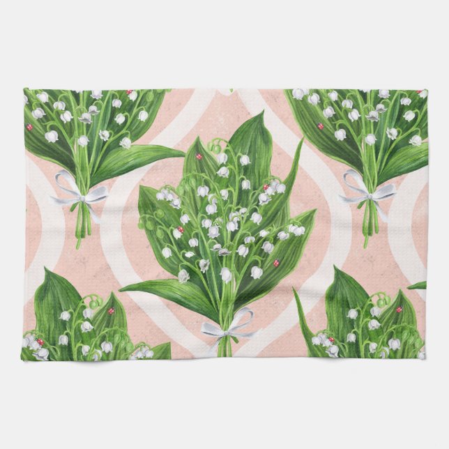 Bouquet of lilly of the valley flowers on pink kitchen towel (Horizontal)