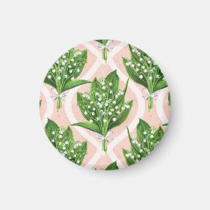 Bouquet of lilly of the valley flowers on pink magnet